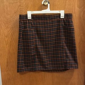 Loft skirt. Zip back. Hits just above my knee and I’m 5’5